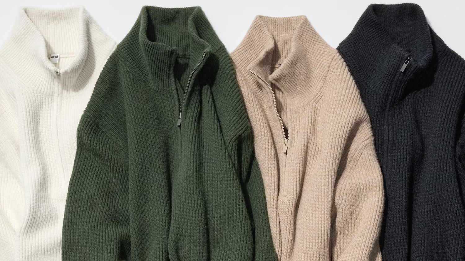 Deze quarter zip van Uniqlo kost €49,90 en is de hype-trui van nu