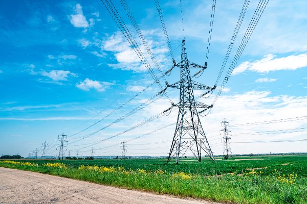 Electric high voltage tower with electric line near Keadby Power Station, England, UK
