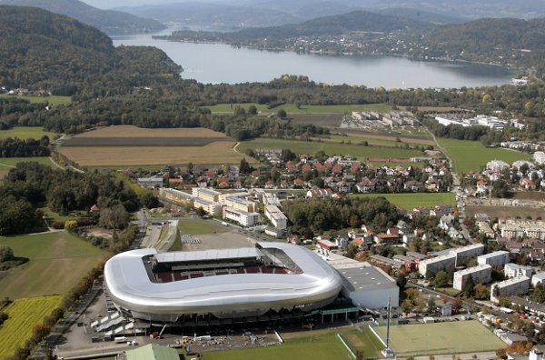 ** FILE ** Aerial view of the of the Woerthersee stadium with lake Woerthersee in the background, in Klagenfurt, Austria, on Monday, Oct. 1, 2007. The Woerthersee stadium will host matches during the EURO 2008 soccer championships. On Thursday, Feb 28, 2008 it's 100 days to go for the opening match of the soccer Euro 2008 on June 7, 2008 in Basel. The Euro 2008 runs through June 29, 2008.   (AP Photo/Gert Eggenberger)