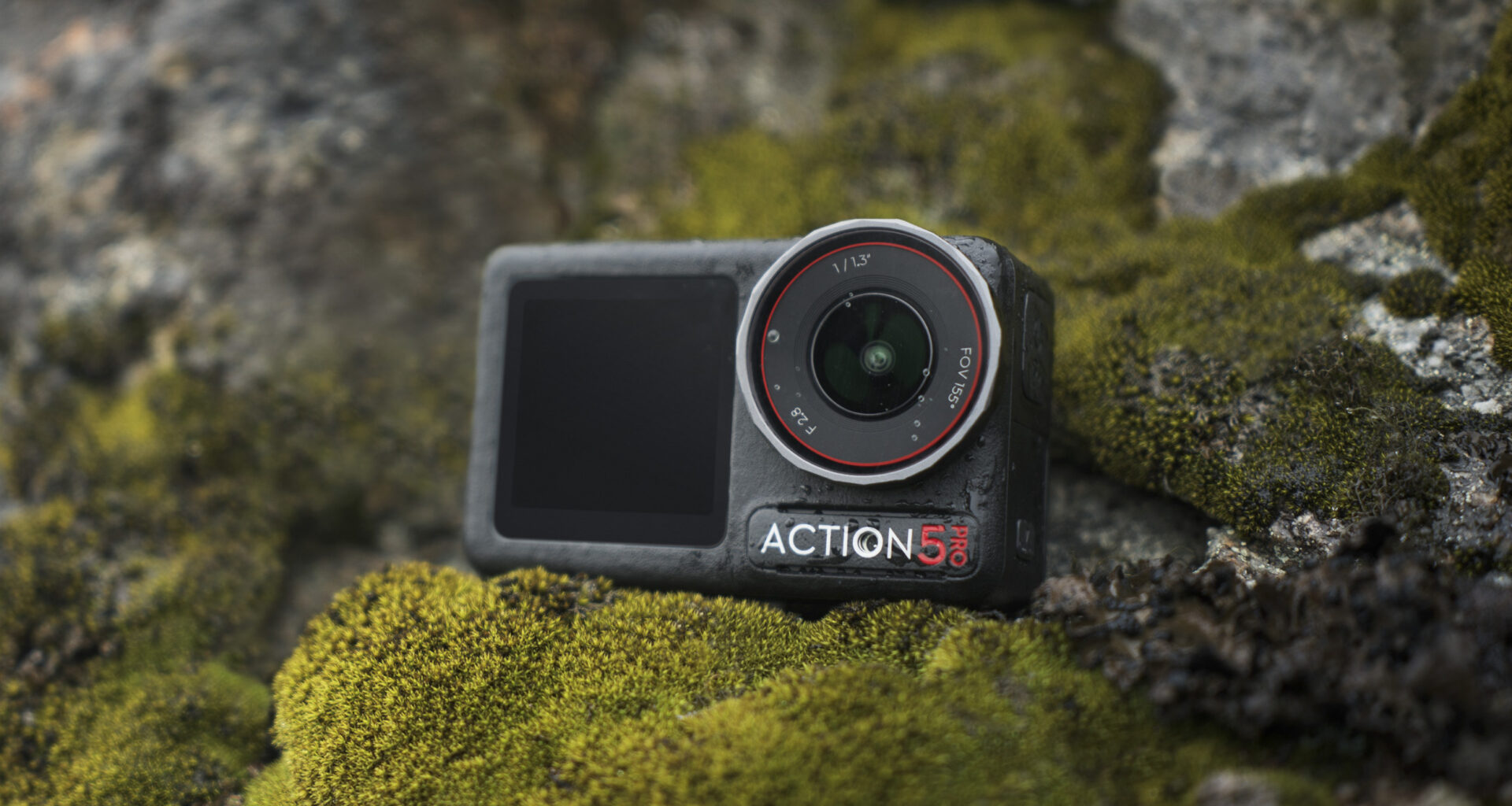 DJI Osmo Action 5 Pro camera on a mossy rock