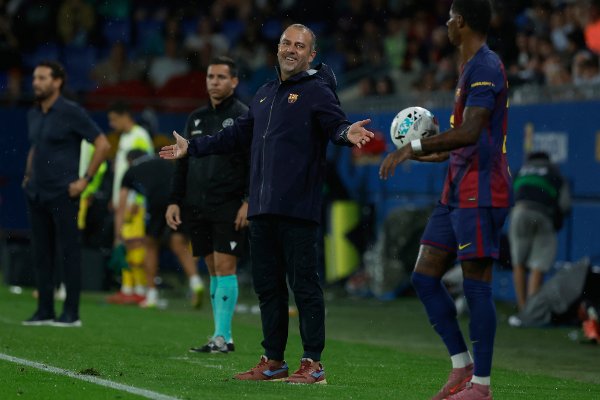 Barcelona's head coach Hansi Flick reacts during a Spanish La Liga soccer match between FC Barcelona and Getafe at the Johan Cruyff stadium in Barcelona, Spain, Sunday, Sept. 21, 2025. (AP Photo/Joan Monfort)