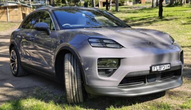The Porsche Macan electric car parked on grass
