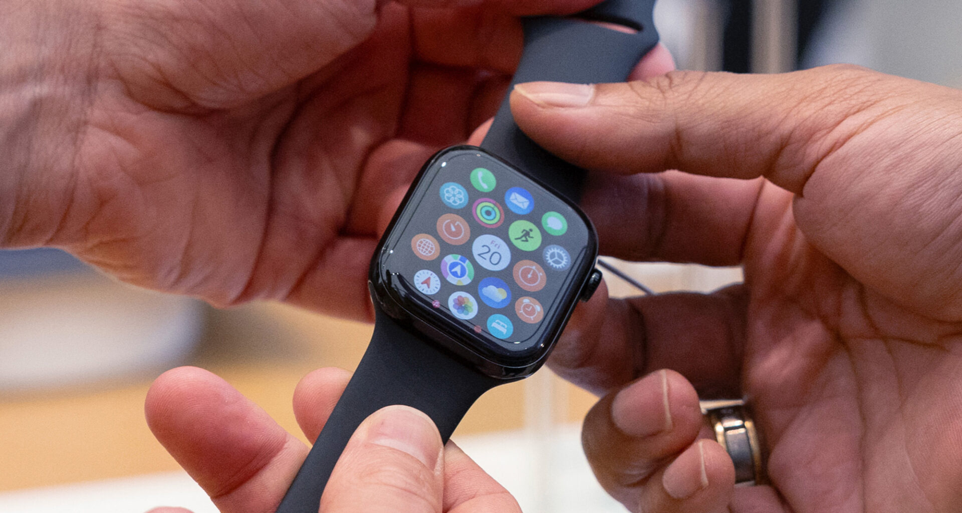Apple Watch Series 10 being held in a hand