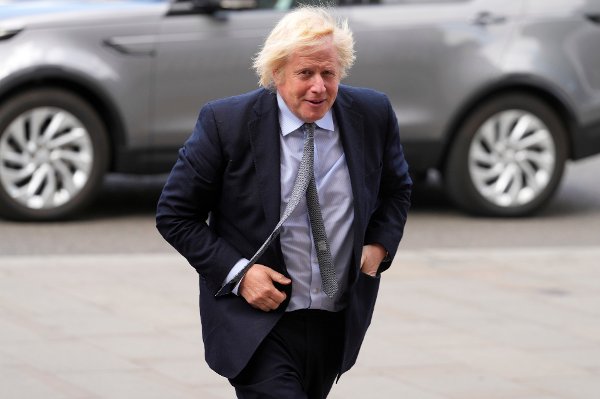 Former Britain's Prime Minister Boris Johnson arrives to attend a Service of Thanksgiving at Westminster Abbey on V-E Day in London, Thursday, May 8, 2025.(AP Photo/Kirsty Wigglesworth)