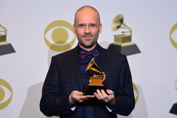 Norwegian sound engineer Morten Lindberg poses with the award for Best Immersive Audio Album for