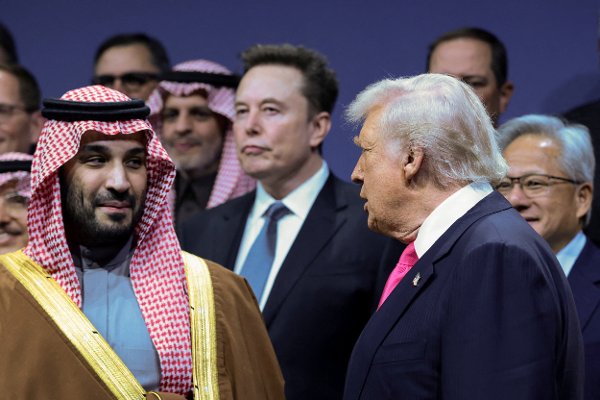 FILE PHOTO: U.S. President Donald Trump, Crown Prince and Prime Minister Mohammed bin Salman of Saudi Arabia, Jensen Huang, CEO of Nvidia, and Elon Musk attend the U.S.-Saudi Investment Forum in Washington, D.C., U.S., November 19, 2025. REUTERS/Evelyn Hockstein/File Photo