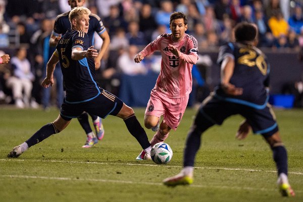 Inter Miami's Lionel Messi, center, goes after the ball as it gets past Philadelphia Union's Jakob Glesnes, right, during the second half of an MLS soccer match, Saturday, May 24, 2025, in Chester, Pa.. (AP Photo/Chris Szagola)