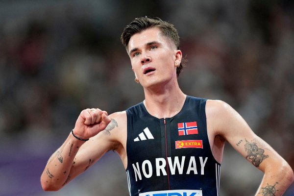 Norway's Jakob Ingebrigtsen reacts after finishing a men's 5,000 meters heat at the World Athletics Championships in Tokyo, Friday, Sept. 19, 2025. (AP Photo/Petr David Josek)