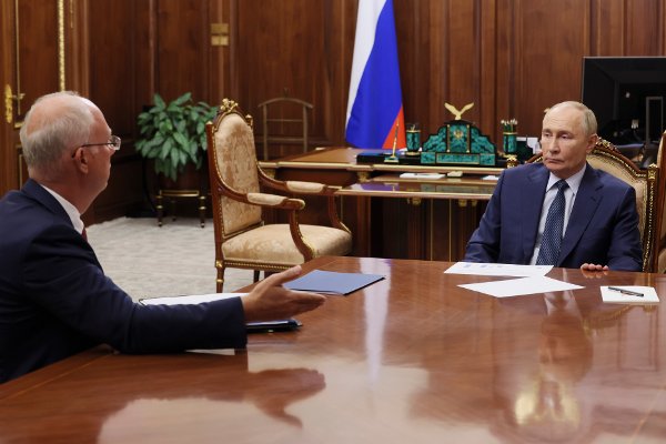 Russian President Vladimir Putin, right, speaks with the CEO of the Russian Direct Investment Fund Kirill Dmitriev during their meeting at the Kremlin in Moscow, Russia, Monday, Jan. 13, 2025. (Alexander Kazakov, Sputnik, Kremlin Pool Photo via AP)