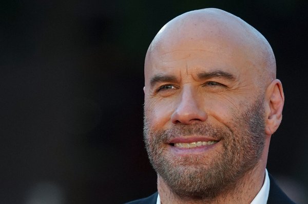 Actor John Travolta poses during a red carpet at the Rome Film Fest, in Rome, Tuesday, Oct. 22, 2019. (AP Photo/Andrew Medichini)