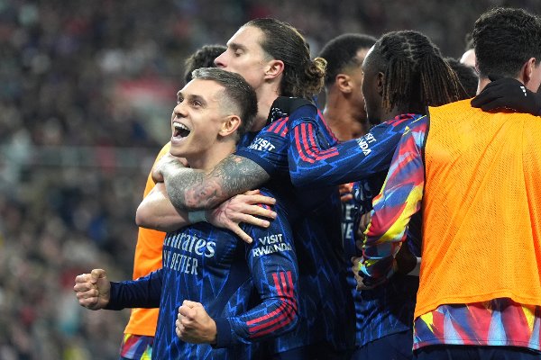 Arsenal's Leandro Trossard (left) celebrates scoring their side's second goal of the game with team-mates during the Premier League match at the Stadium of Light, Sunderland. Picture date: Saturday November 8, 2025.