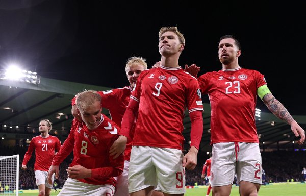 Soccer Football - FIFA World Cup - UEFA Qualifiers - Group C - Scotland v Denmark - Hampden Park, Glasgow, Scotland, Britain - November 18, 2025
Denmark's Rasmus Hojlund celebrates scoring their first goal with Gustav Isaksen, Victor Froholdt and Pierre-Emile Hojbjerg Action Images via Reuters/Lee Smith