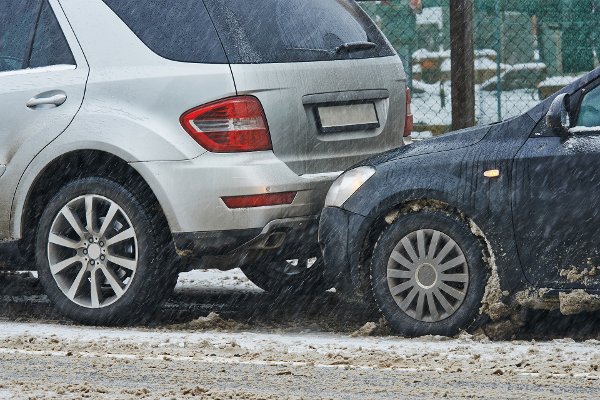 car crash collision accident on an city road in winter
