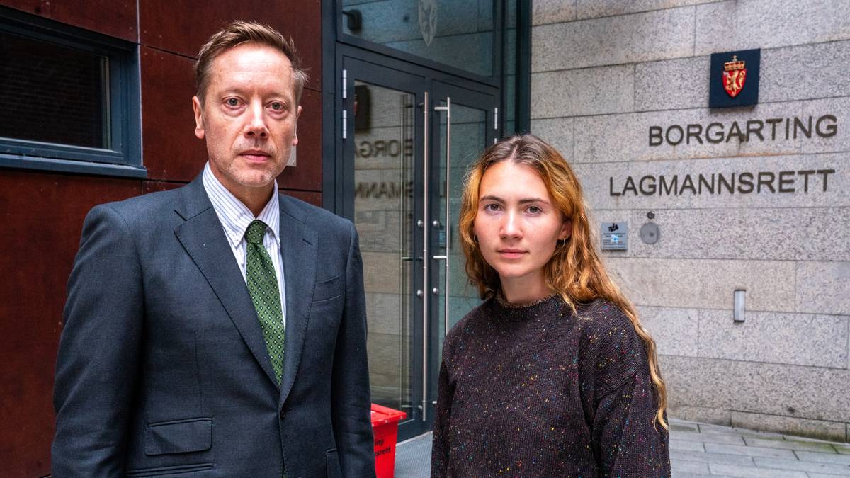 en mann og kvinne som poserer for et bilde