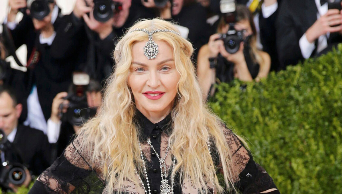 Et sjeldent familiebilde med sønnen Rocco