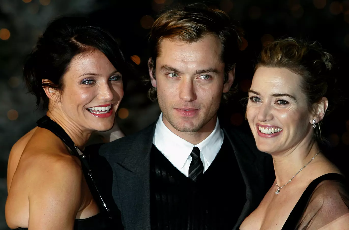 «THE HOLIDAY»: Cameron Diaz, Jude Law og Kate Winslet under den britiske premieren på romantiske julefilmen i 2006. Foto: Kirsty Wigglesworth/AP/NTB