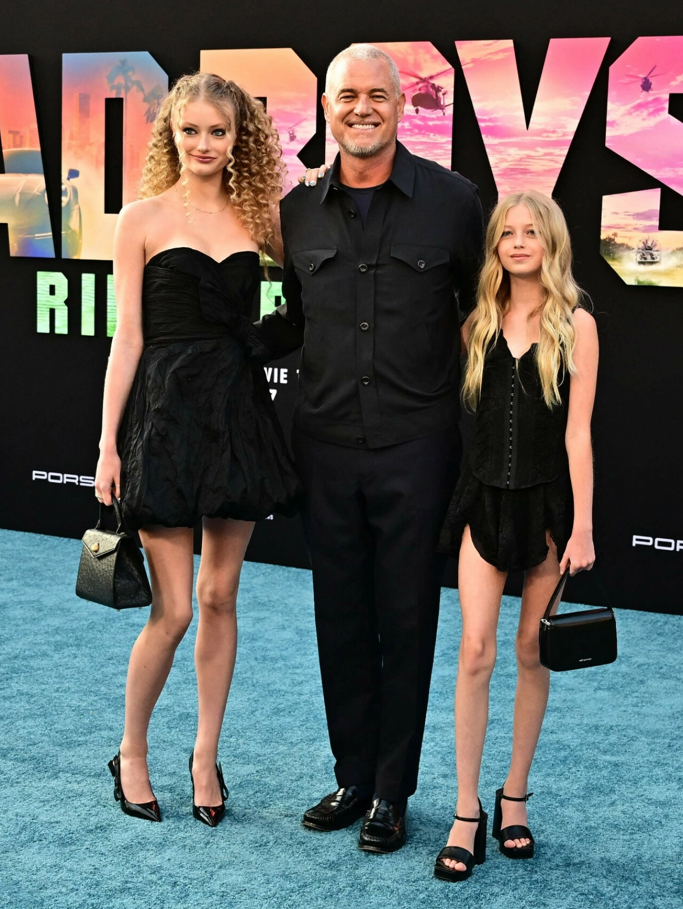 STOLT PAPPA: Eric har tidligere uttalt at han har et sterkt ønske om å se døtrene gifte seg. Her er de avbildet sammen i fjor. Foto: Frederic J. Brown / AFP/ NTB