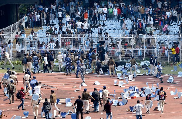 Soccer Football - Argentine soccer star Lionel Messi on a whirlwind tour of India - Vivekananda Yuva Bharati Krirangan, Kolkata, India - December 13, 2025
Plastic water bottles and chairs are seen scattered on the field after Argentine soccer star Lionel Messi leaves the stadium REUTERS/Sahiba Chawdhary