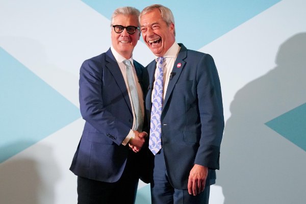 Reform UK leader Nigel Farage (right) at the MacDonald Inchyra Hotel & Spa in Falkirk, with Lord Malcolm Offord who was announced by Nigel Farage as the latest defector to join the party during the rally in Falkirk. Picture date: Saturday December 6, 2025.