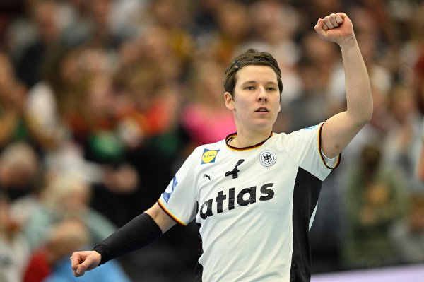Germany's centre back #04 Alina Grijseels reacts during the main round - Day 5 Group II handball match Montenegro v Germany of the IHF Women's Handball World Championship in Dortmund, western Germany on December 4, 2025. (Photo by INA FASSBENDER / AFP)