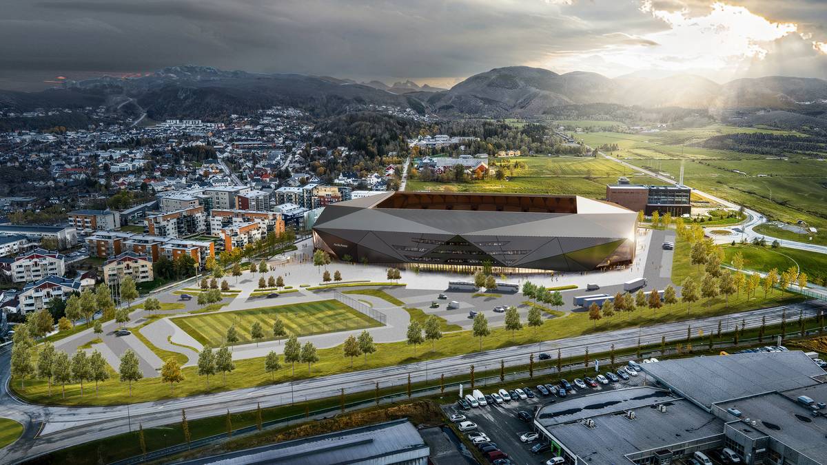 Et flyfoto av en by (Bildebeskrivelsen er laget av en KI-tjeneste)