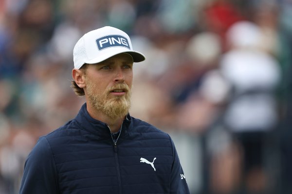 Kristoffer Reitan of Norway walks from the 1st tee during the third round of the British Open golf championship at the Royal Portrush Golf Club, Northern Ireland, Saturday, July 19, 2025. (AP Photo/Peter Morrison)