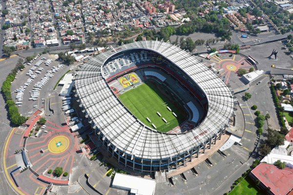 (FILES) Aerial view of the empty Azteca stadium in Mexico City on March 22, 2020, as the Mexican football tournament was postponed to prevent the spread of the new coronavirus COVID-19. The Azteca Stadium, the scene of Pele's and Diego Maradona's stints as football stars, changed its name on March 14, 2025, to that of a bank in exchange for funding for the modernization required to host the World Cup in 2026, Banorte Bank. From today, it will bear the name Estadio Banorte. The kick of match of the World Cup to be co-hosted by the USA, Canada and Mexico from June 19-July 19, 2026, will be held at this iconic venue. (Photo by Alfredo ESTRELLA / AFP)