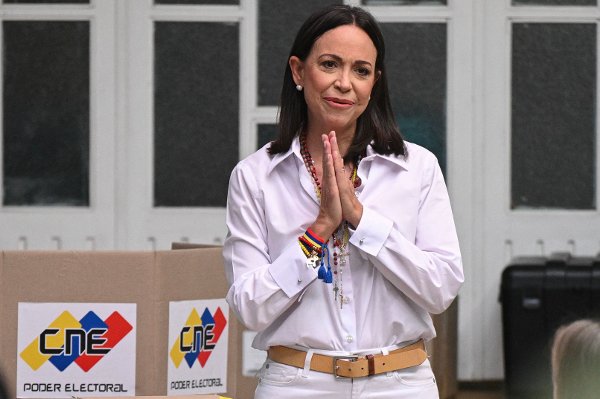 (FILES) Venezuelan opposition leader Maria Corina Machado gestures as she votes during the presidential election, in Caracas on July 28, 2024. Norway's foreign ministry on October 13, 2025 said Venezuela had closed its embassy in Oslo, without giving a reason, days after opposition leader Maria Corina Machado was awarded the Nobel Peace Prize. (Photo by Federico PARRA / AFP)