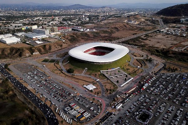 (FILES) This file photo taken on March 16, 2019, shows an aerial view of the Akron stadium in Guadalajara, Jalisco State, Mexico before the Mexican Clausura football tournament match between Guadalajara and America. - At a televised announcement in New York on June 16, 2022, officials confirmed the list of venues for the FIFA 2026 World Cup co-hosted by Canada, Mexico and the United States, for what will be the first ever 48-team World Cup. Mexico will be hosting the finals for a third time after serving as solo hosts in 1970 and 1986. Mexico City's Azteca Stadium will be the first stadium to feature in three separate World Cups. Other Mexican venues include Guadalajara's Estadio Akron and Monterrey's Estadio BBVA. (Photo by ULISES RUIZ / AFP)