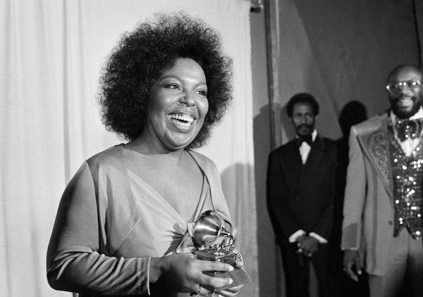 FILE - Roberta Flack holds the Grammy award for her record, 