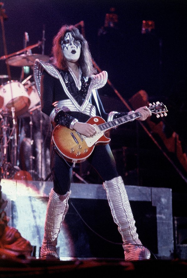 FILE - Ace Frehley, lead guitarist for the hard-rock glam band KISS, performs with a Les Paul guitar during a concert at the Civic Center in Harford, Conn., Feb. 16, 1977. (AP Photo/Richard Drew, File)