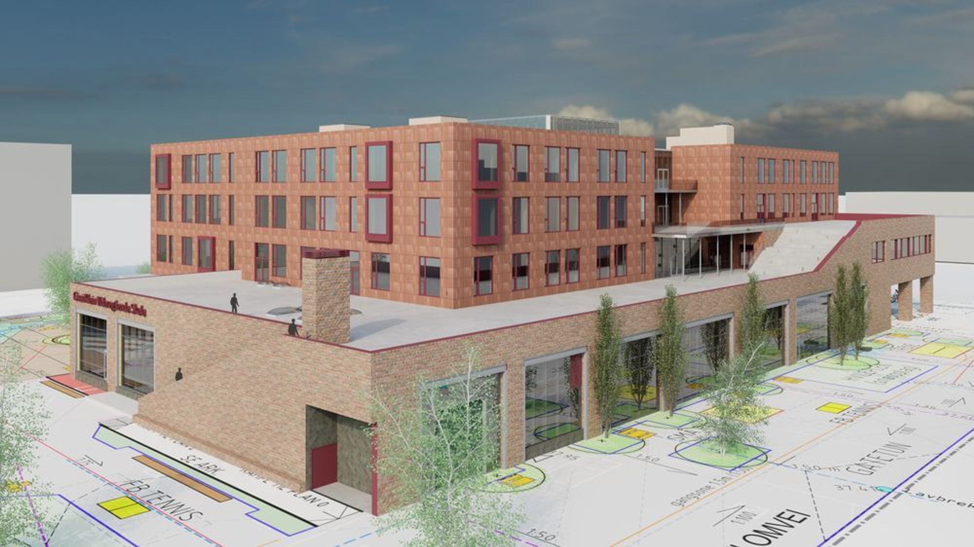 Prosjektleder Hege Hedlevær (i midten) sier de har lagt opp til at skolebygget kan koble seg på fjernvarme etter hvert. Her står hun i en av Cissi Klein videregående skoles trapper, som er bygget med gjenbruksmaterialer.