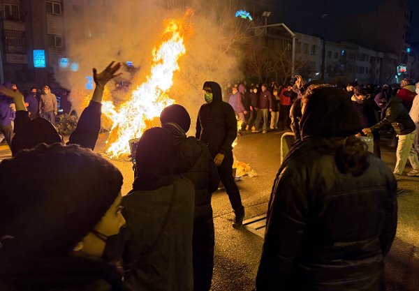 In this photo obtained by The Associated Press, Iranians attend an anti-government protest in Tehran, Iran, Friday, Jan. 9, 2026. (UGC via AP)