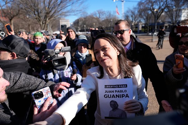 Venezuelan opposition leader María Corina Machado greets supporters on Pennsylvania Avenue near the White House after meeting with President Donald Trump Thursday, Jan. 15, 2026, in Washington. (AP Photo/Pablo Martinez Monsivais)