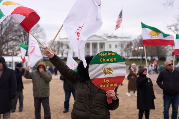 Supporters of the National Council of Resistance of Iran rally outside the White House for regime change in Iran, Wednesday, Dec. 31, 2025, in Washington. (AP Photo/Evan Vucci)