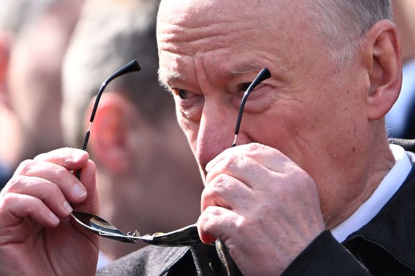 Russia's Secretary of the Security Council Nikolai Patrushev takes off his glasses as he attends the Victory Day military parade in central Moscow on May 9, 2025. Russia celebrates the 80th anniversary of the Soviet Union's victory over Nazi Germany in World War Two (WWII). (Photo by Kirill KUDRYAVTSEV / AFP)