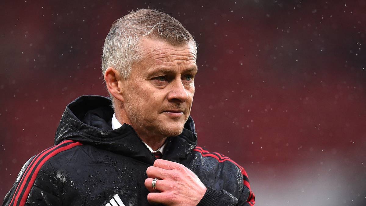 Manchester United's Norwegian manager Ole Gunnar Solskjaer reacts at the final whistle during the...