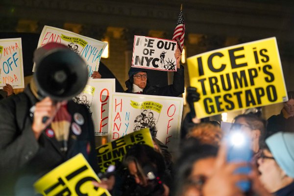 People participate in a protest in response to the fatal shooting of Renee Nicole Good by a Federal immigration officer this morning in Minneapolis, Wednesday, Jan. 7, 2026, in New York. (AP Photo/Ryan Murphy)