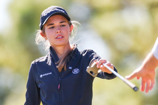 BELLEAIR, FLORIDA - NOVEMBER 12: Amateur golfer Kai Trump reacts on from the 11th green prior to The ANNIKA driven by Gainbridge at Pelican 2025 at Pelican Golf Club on November 12, 2025 in Belleair, Florida.   Douglas P. DeFelice/Getty Images/AFP (Photo by Douglas P. DeFelice / GETTY IMAGES NORTH AMERICA / Getty Images via AFP)