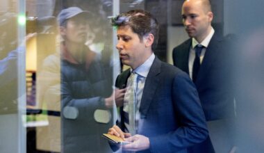 OpenAI CEO Sam Altman, center, and OpenAI President Gregory Brockman