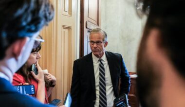 Senate Majority Leader John Thune speaks to reporters following a vote on Capitol Hill.