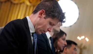 OpenAI CEO Sam Altman (L) attends a meeting of the White House Task Force on Artificial Intelligence Education in the East Room of the White House. (Photo by Chip Somodevilla/Getty Images)