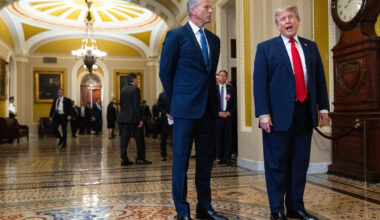 Senate Majority Leader John Thune, R-S.D., listens as President Donald Trump speaks to the media as he arrives for a Senate GOP lunch meeting in the Capitol on June 24.