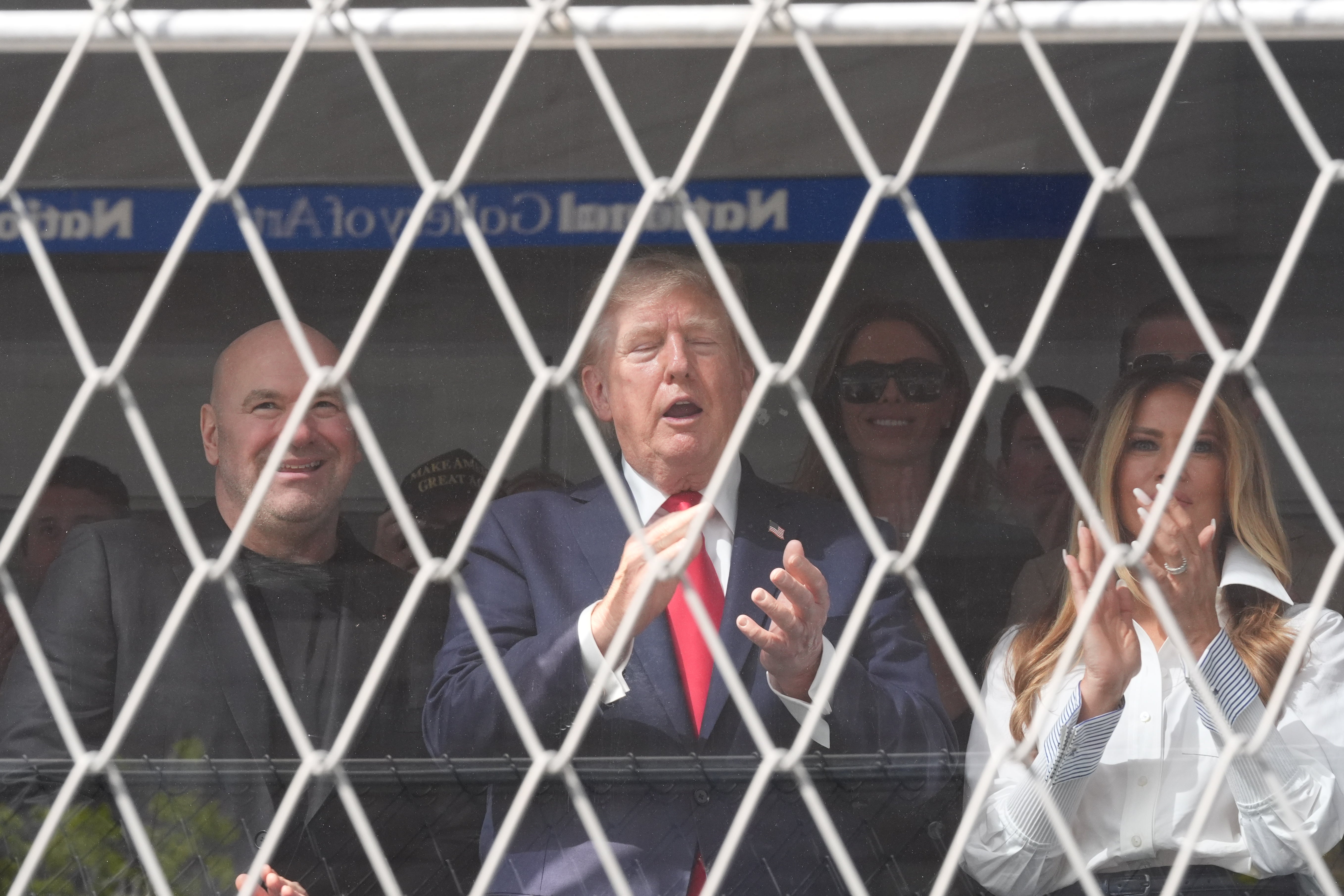 Various Trump allies, including UFC CEO Dana White, sat with the president as he cheered on the 25 drivers competing in the Freedom 250 Grand Prix