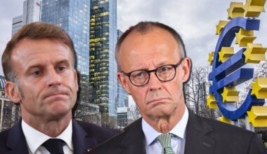 Emmanuel Macron i Friedrich Merz, w tle znak euro przy Europejskim Banku Centralnym, Frankfurt nad Menem, 2019 r.