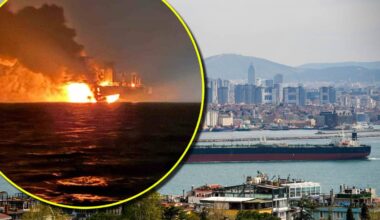 Tankowiec płonący na morzu, widoczny na pierwszym planie w okrągłym wycinku, oraz inny tankowiec na wodzie z panoramą miasta w tle.