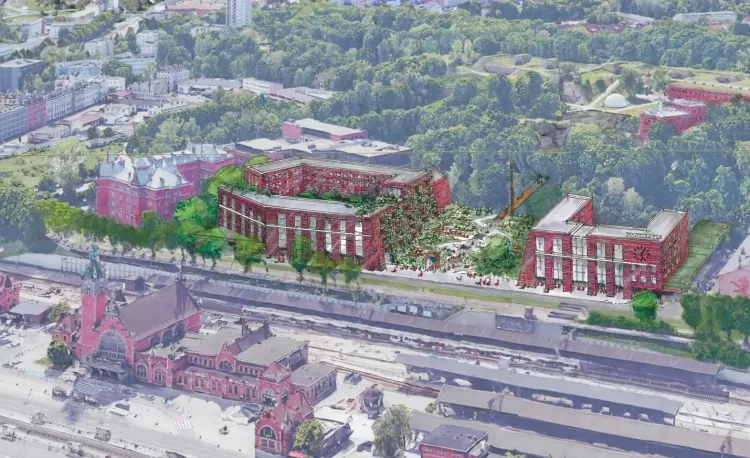 Poprzednia wizja również zakładała powstanie dwóch nowych budynków, ale plac między nimi miał się wznosić ukośnie na całej szerokości i pod nim miały parkować autobusy. 