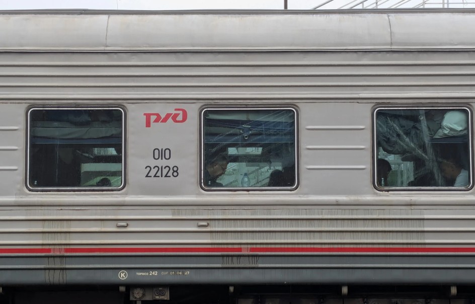 Pasażerowie w rosyjskim pociągu