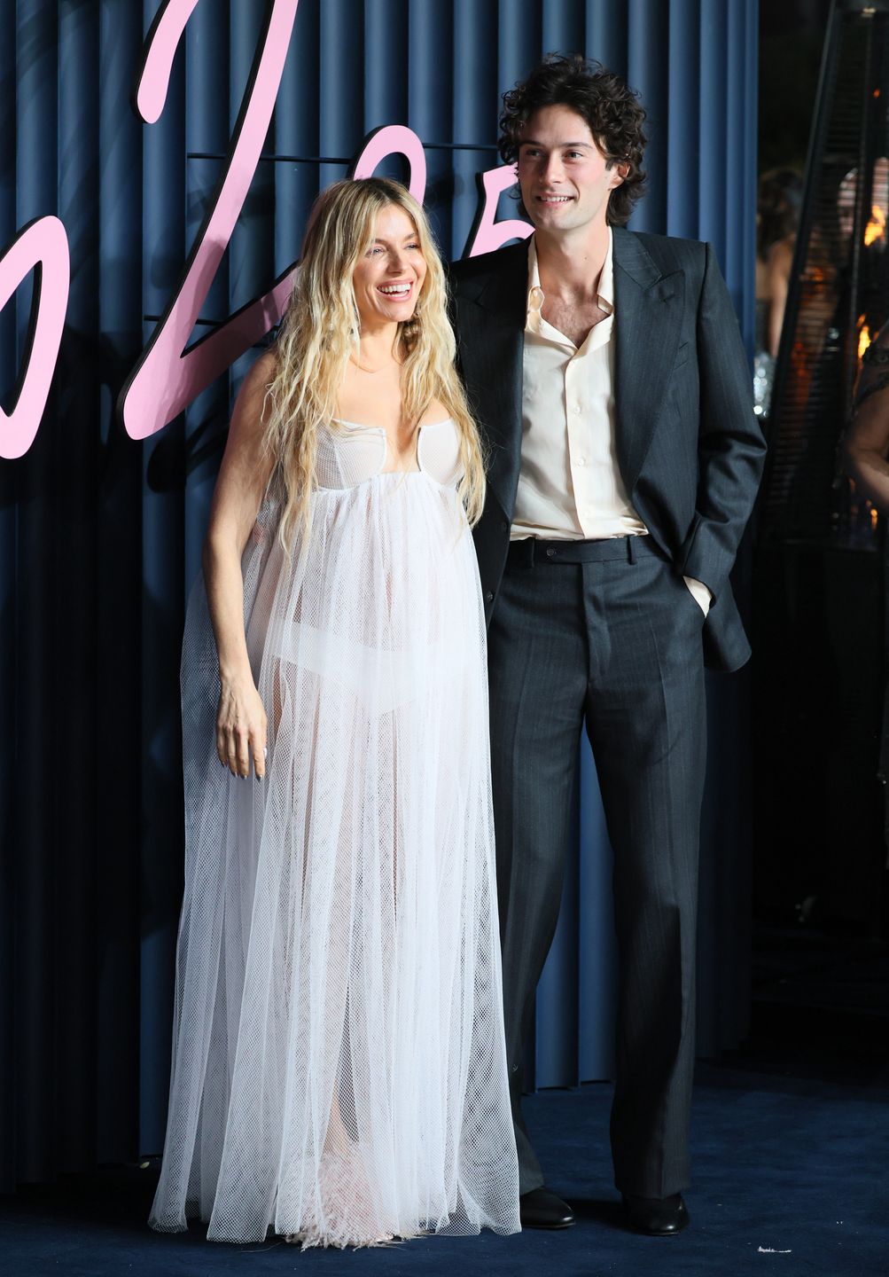 LONDON, ENGLAND - DECEMBER 1: Sienna Miller and Oli Green attend The Fashion Awards 2025 presented by Pandora at the Royal Albert Hall on December 1, 2025 in London, England. (Photo by JB Lacroix/FilmMagic)