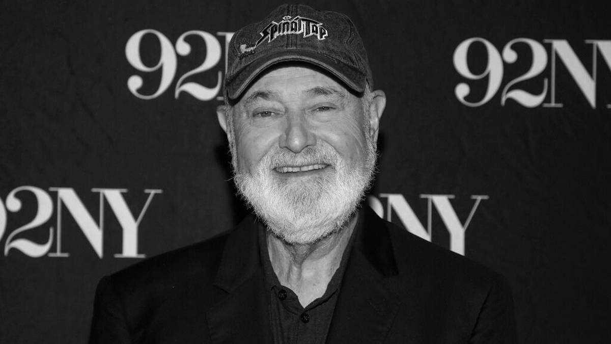 Starszy mężczyzna z siwą brodą i bejsbol&oacute;wką.